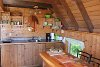 Fully equipped kitchen with an induction hob and a microwave for cooking